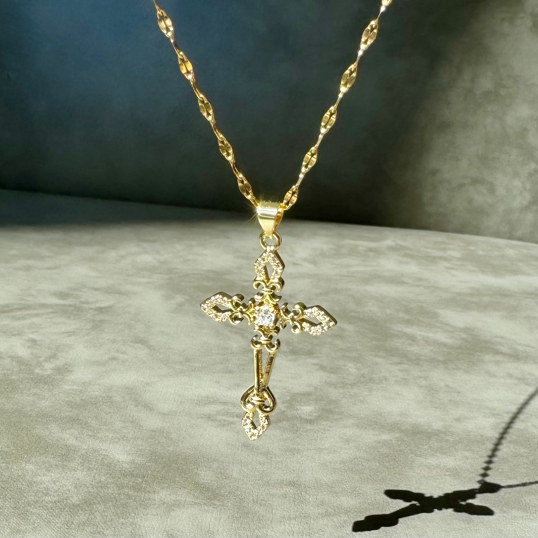 Buy the Gold Ornate Crystal Religious Cross Necklace | JaeBee Jewelry